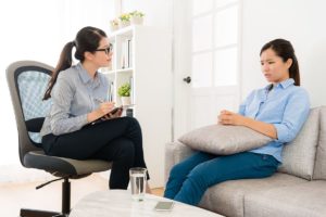 young woman and therapist beginning work at the Acute Stress Disorder Treatment Center San Diego offers