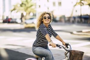 woman biking at an outpatient drug rehab near La Mesa CA
